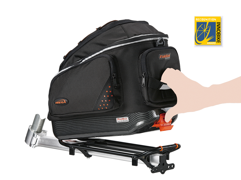 Clip-on bike trunk bag with hard base, reinforced, padded body.